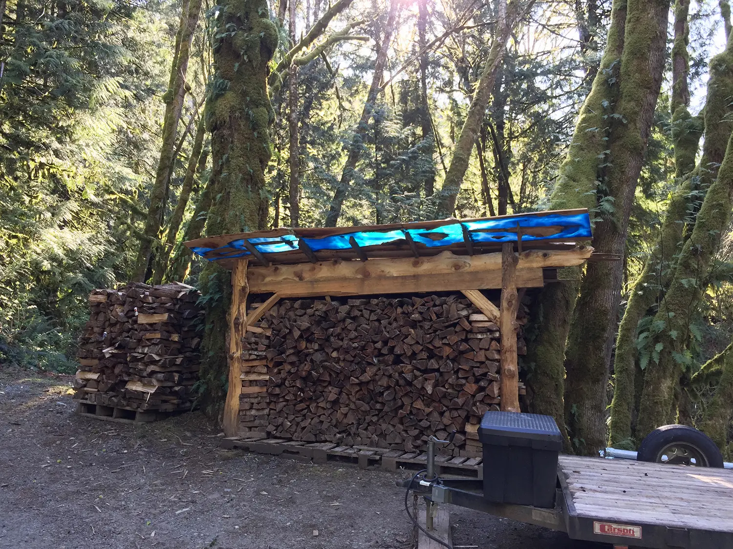 Wood Shed With Resin River Roof